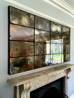 Framed antique mirror glass feature wall by Devlin In Design decorative artists.